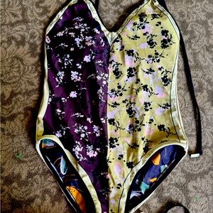 One piece swimsuit, reversible. Adorable print.